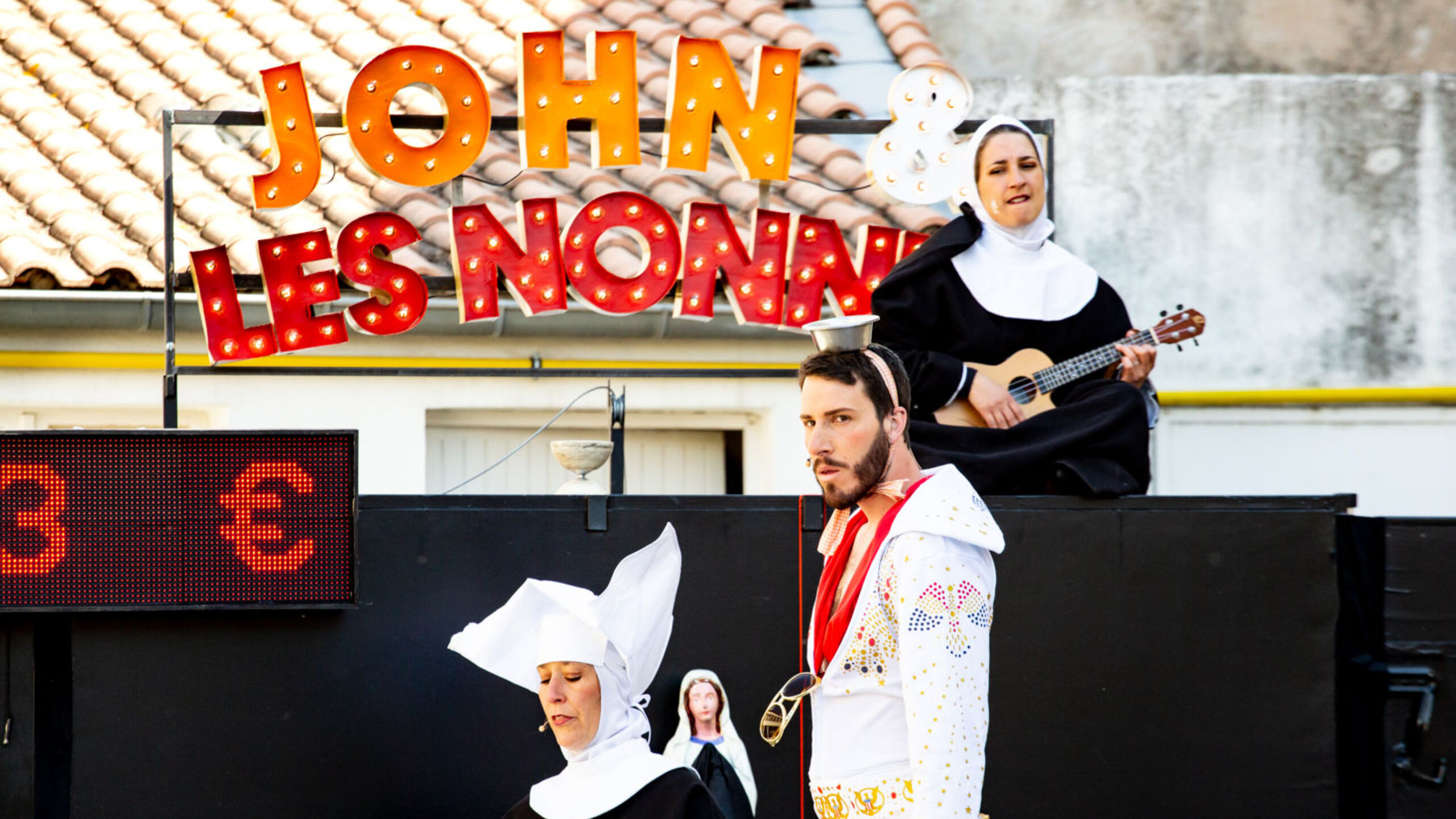 Cliquez ici pour en savoir plus sur John & Les nonnes